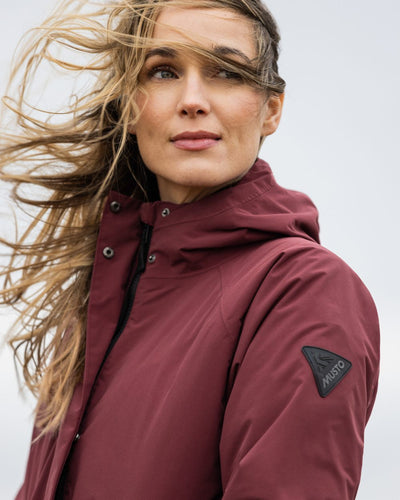 Windsor Wine coloured Musto Womens Primaloft 3 in 1 Parka on sky background #colour_windsor-wine