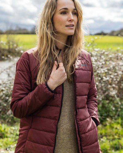 Windsor Wine coloured Musto Womens Primaloft 3 in 1 Parka on garden background #colour_windsor-wine