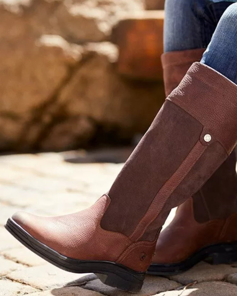 Dark Brown Coloured Ariat Windermere II Waterproof Boots On A Blurry Background