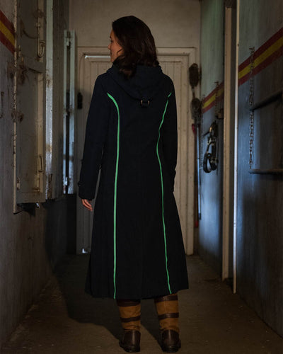 Navy Blue Coloured Baleno Kensington Safe Womens Long Riding Coat On A Stable Background #colour_navy-blue