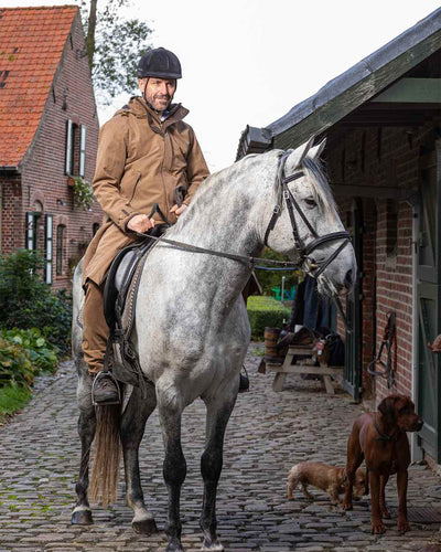 Camel Coloured Baleno Livingstone Long Waterproof Coat On A Street Background #colour_camel