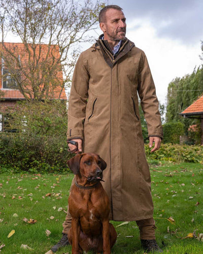 Camel Coloured Baleno Livingstone Long Waterproof Coat On A Backyard Background #colour_camel