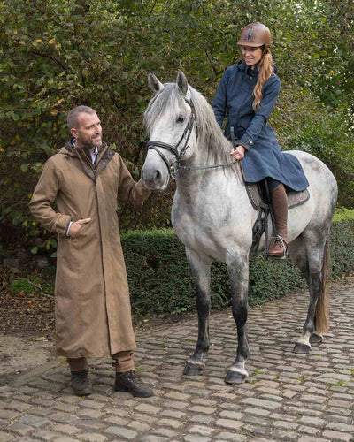 Camel Coloured Baleno Livingstone Long Waterproof Coat On A Street Background #colour_camel