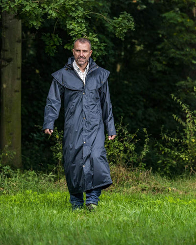 Navy Blue Coloured Baleno Newbury Waterproof Long Coat On A Street Background #colour_navy-blue