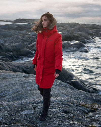 Pomme Red Coloured Didriksons Erika Ladies Padded Waterproof Parka 3 On A Coastal Background #colour_pomme-red