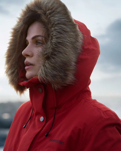 Pomme Red Coloured Didriksons Erika Ladies Padded Waterproof Parka 3 On A Coastal Background #colour_pomme-red