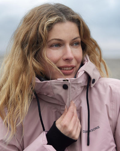 Oyster Lilac Coloured Didriksons Womens Elissa Parka On A Coastal Background #colour_oyster-lilac