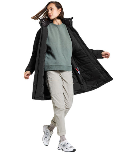 Black Coloured Didriksons Womens Ilsa Parka On A White Background #colour_black