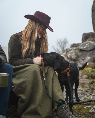 Merlot Coloured Hoggs Of Fife Perth Crushable Felt Hat On model with mountain Background #colour_merlot