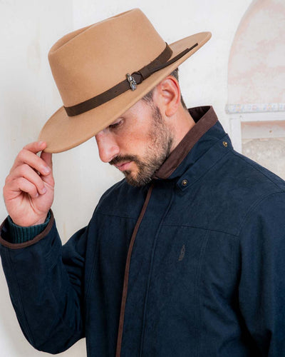 Tan coloured Jack Murphy Boston Crushable Felt Hat on wall background #colour_tan