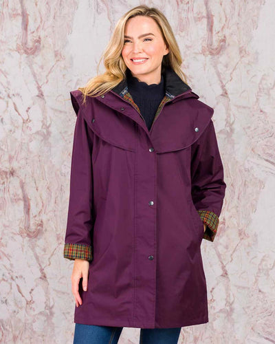 Blackberry coloured Jack Murphy Cotswold Ladies Waterproof 3/4 Coat on Pink background #colour_blackberry