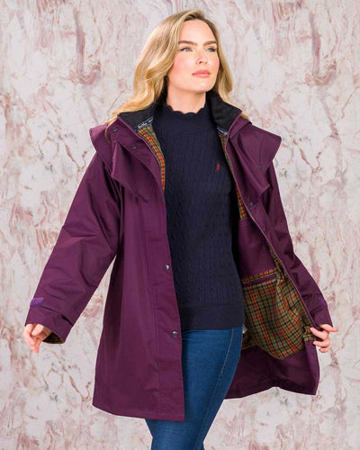 Blackberry coloured Jack Murphy Cotswold Ladies Waterproof 3/4 Coat on Pink background #colour_blackberry