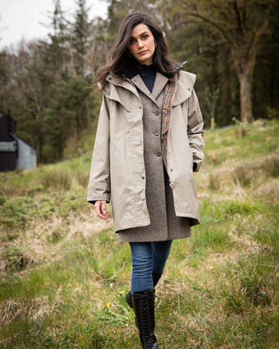 Chincilla coloured Jack Murphy Cotswold Ladies Waterproof 3/4 Coat on forest background #colour_chinchilla