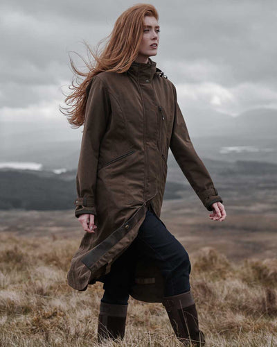 Sage coloured Hoggs of Fife Struther Ladies Long Riding Coat on grassy background #colour_sage